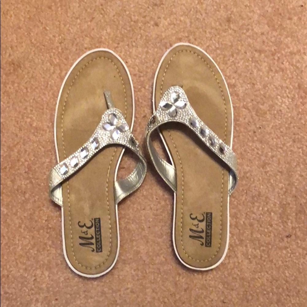 M & E Collection flip flops.